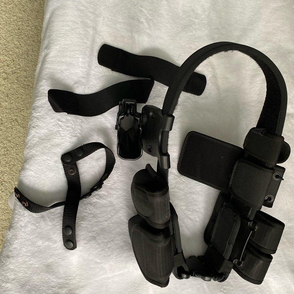 Bianchi gun belt with accessories. Snap closures included. 36”.